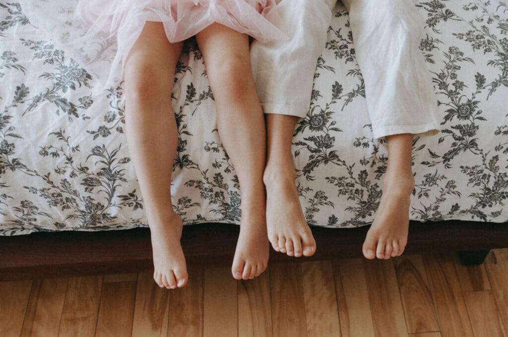 children's feet captured during a storytelling family session
