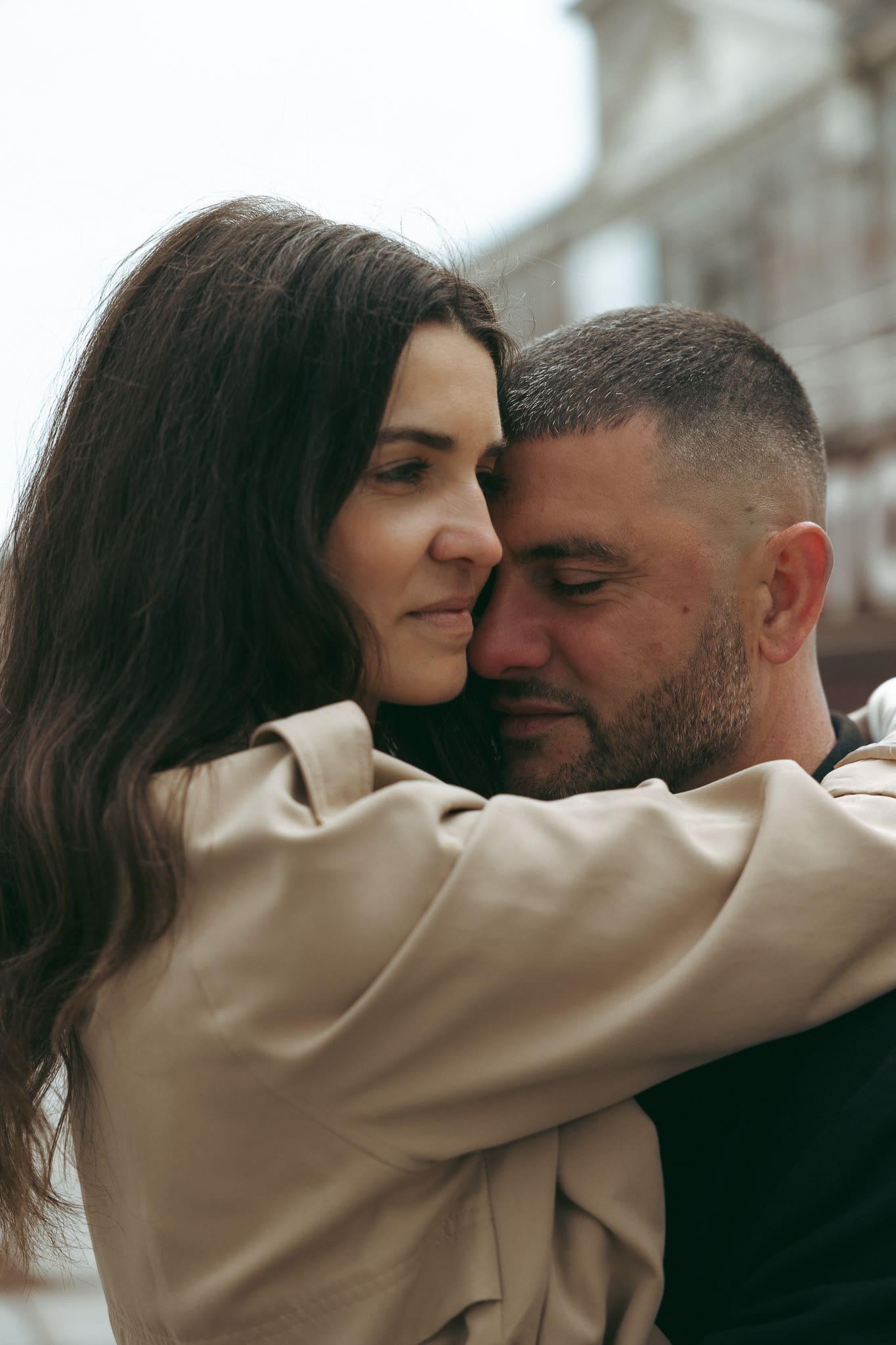 A couple embracing each other for a photoshoot in Montreal